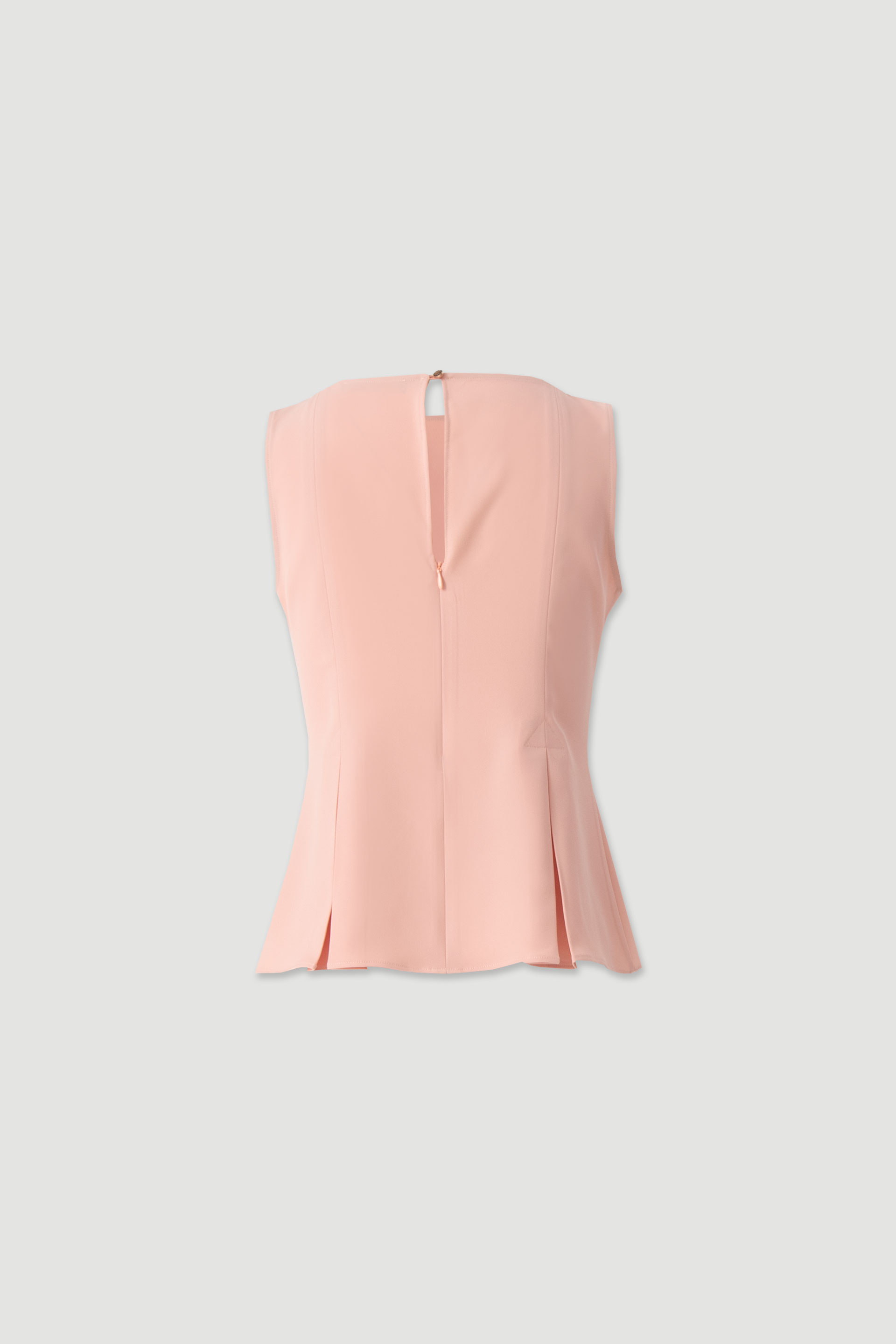 Sleeveless flowing top with side slits
