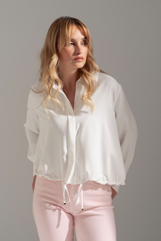 Fluid blouse with adjustable drawstring Fluid blouse with adjustable drawstring