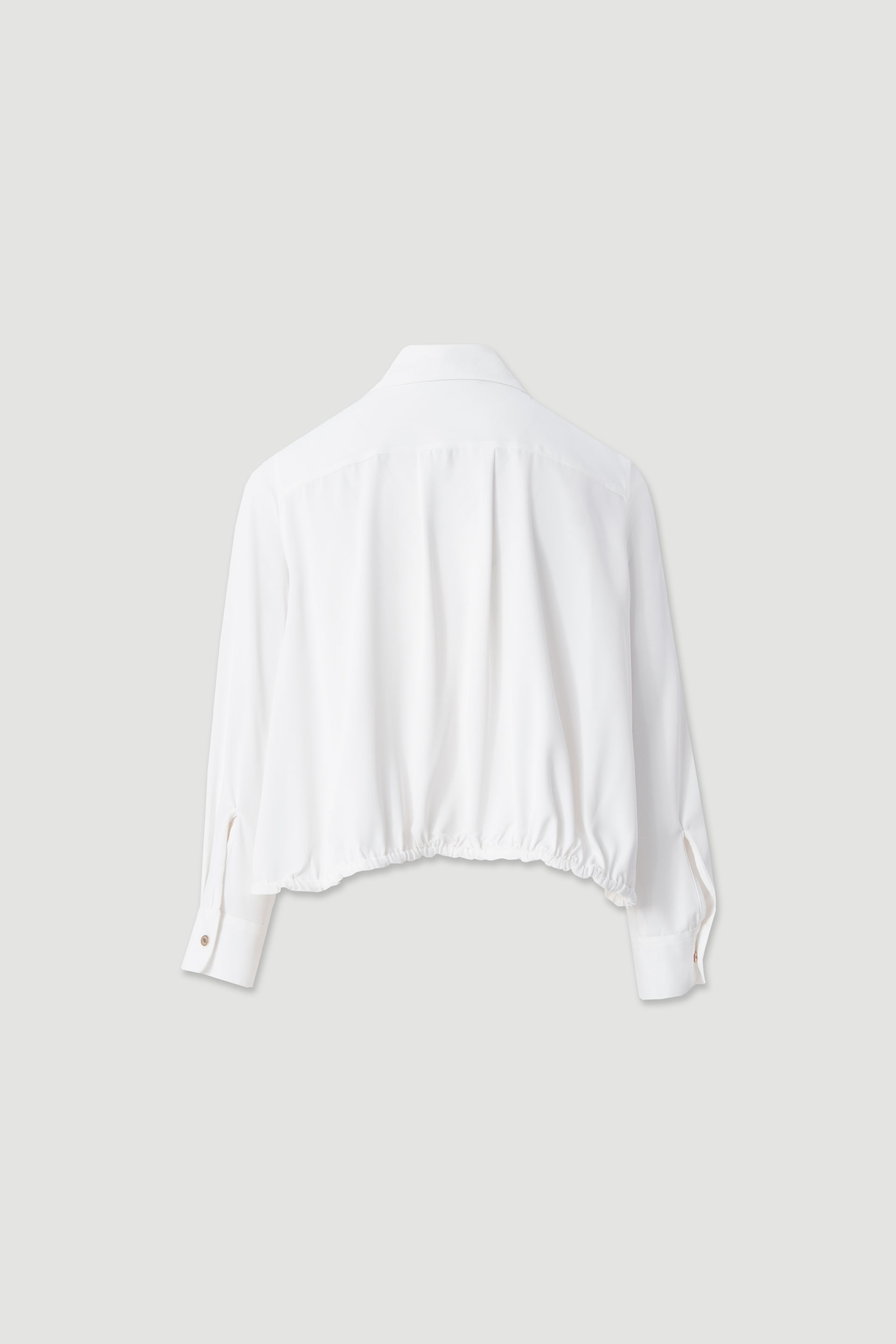 Fluid blouse with adjustable drawstring