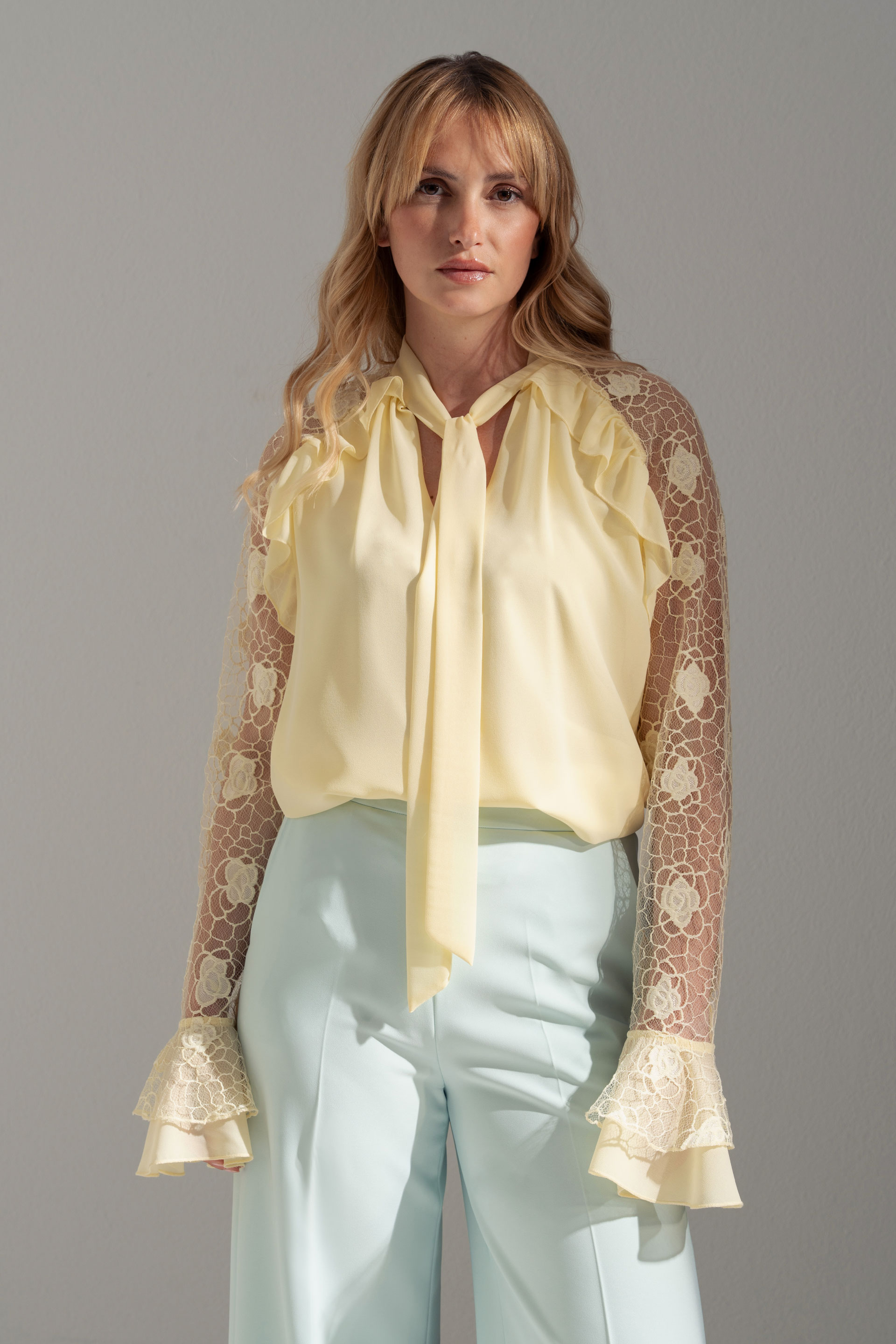 Blouse with bow and lace sleeves