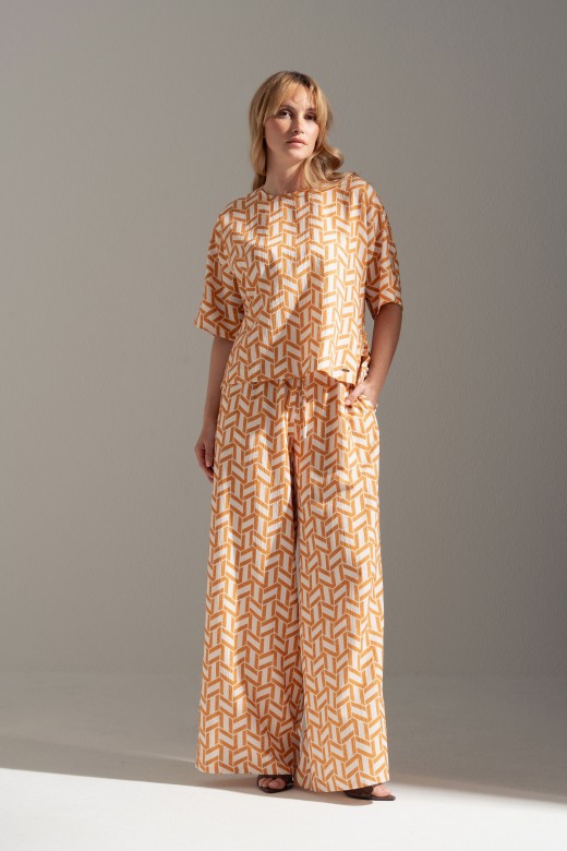 Flowy printed trousers with elastic waist Flowy printed trousers with elastic waist