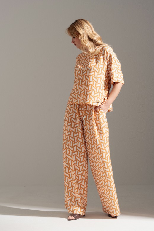 Flowy printed trousers with elastic waist Flowy printed trousers with elastic waist