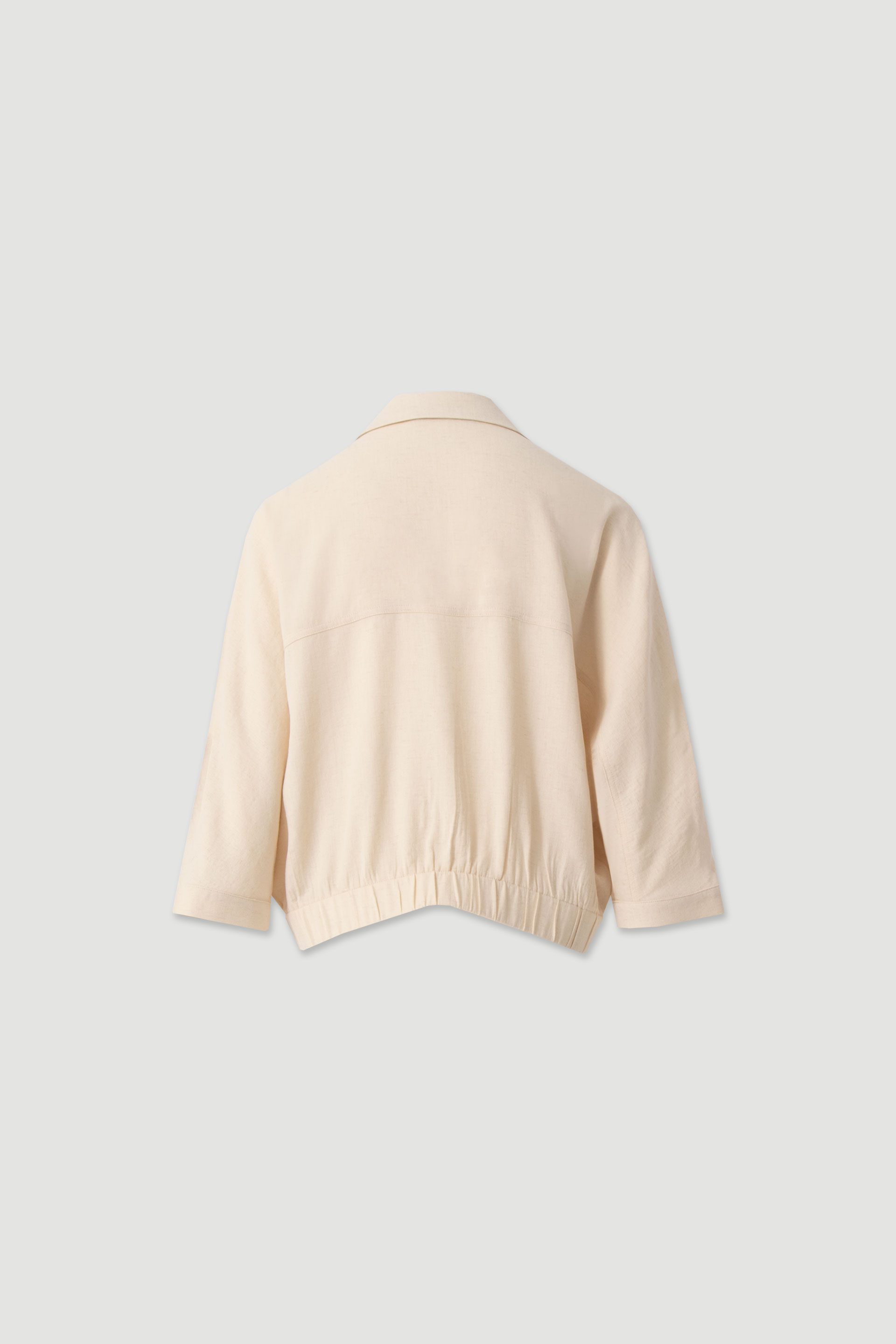 Linen jacket with pockets and elastic hem