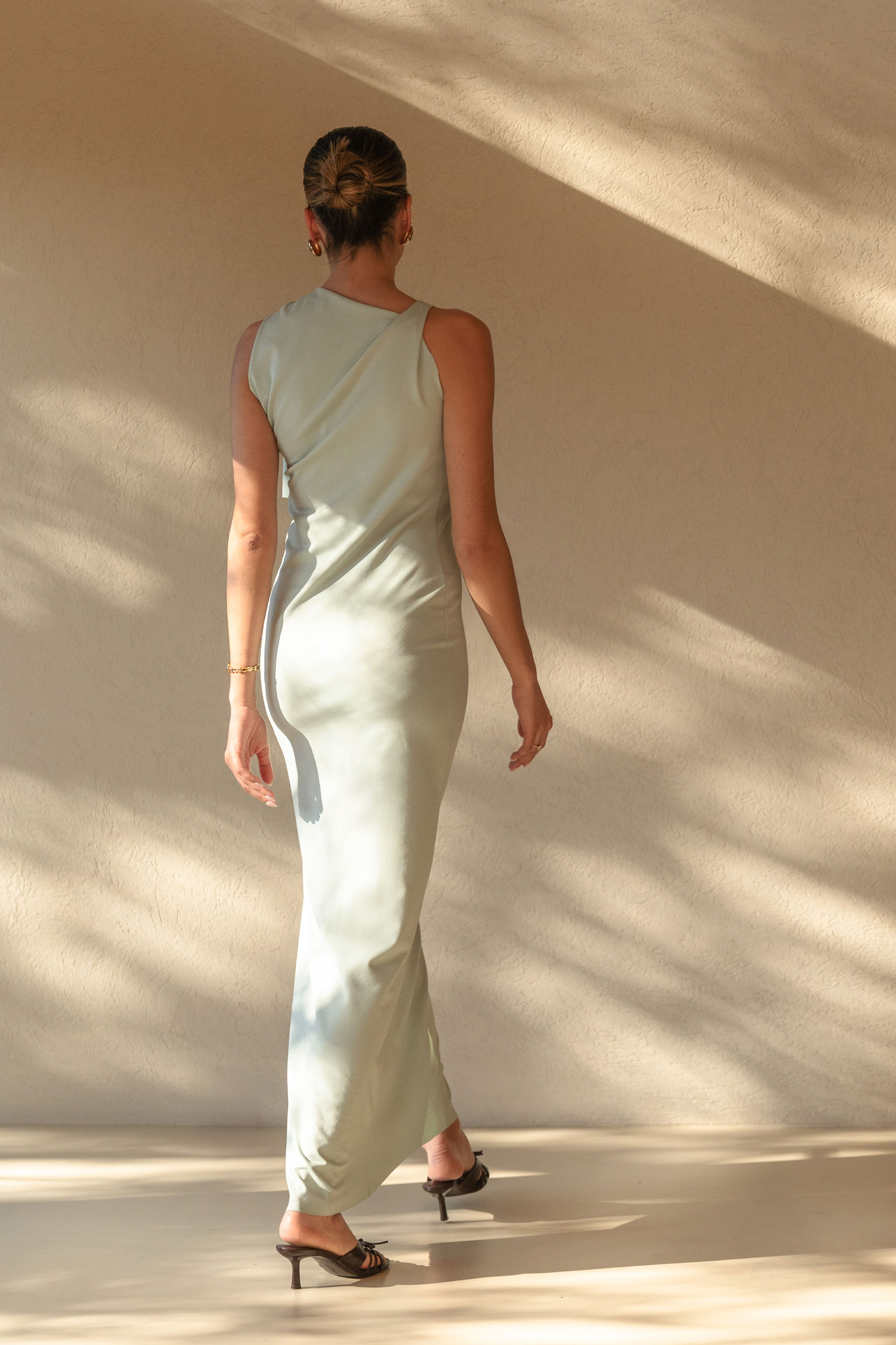 Long dress with draping and shoulder tie