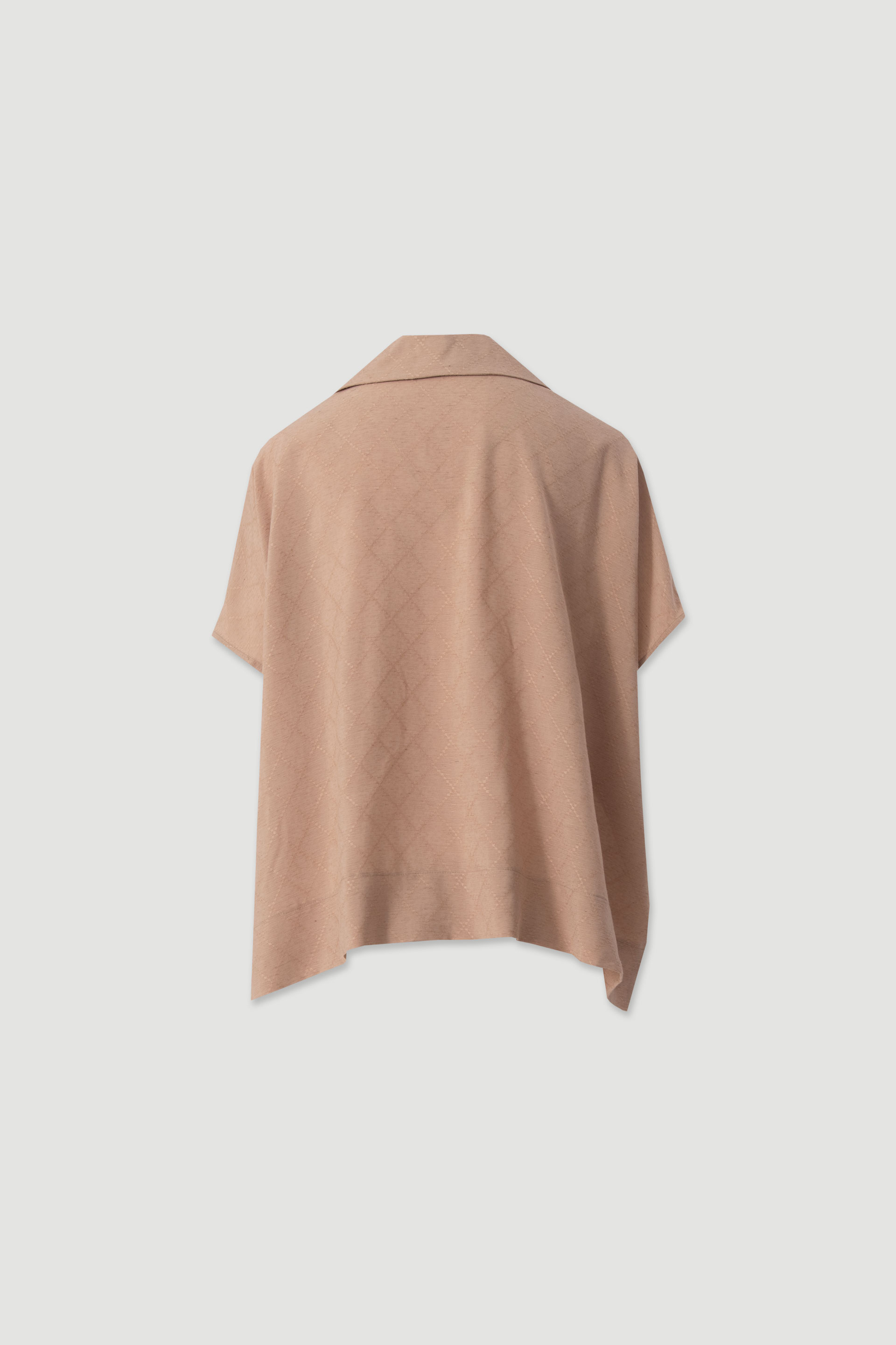 Flowing tunic with crossover neckline
