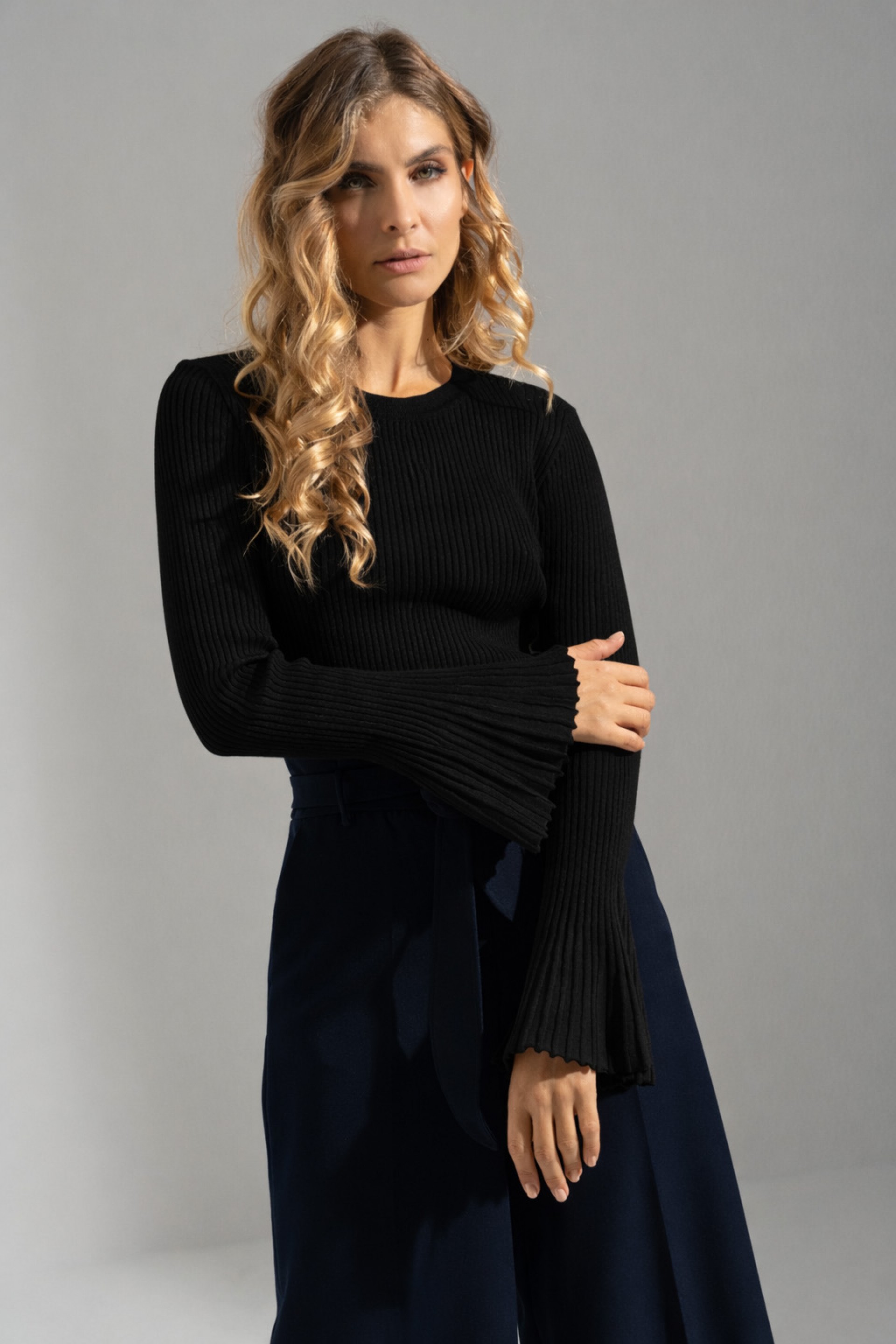 Ribbed knit sweater with flare sleeves