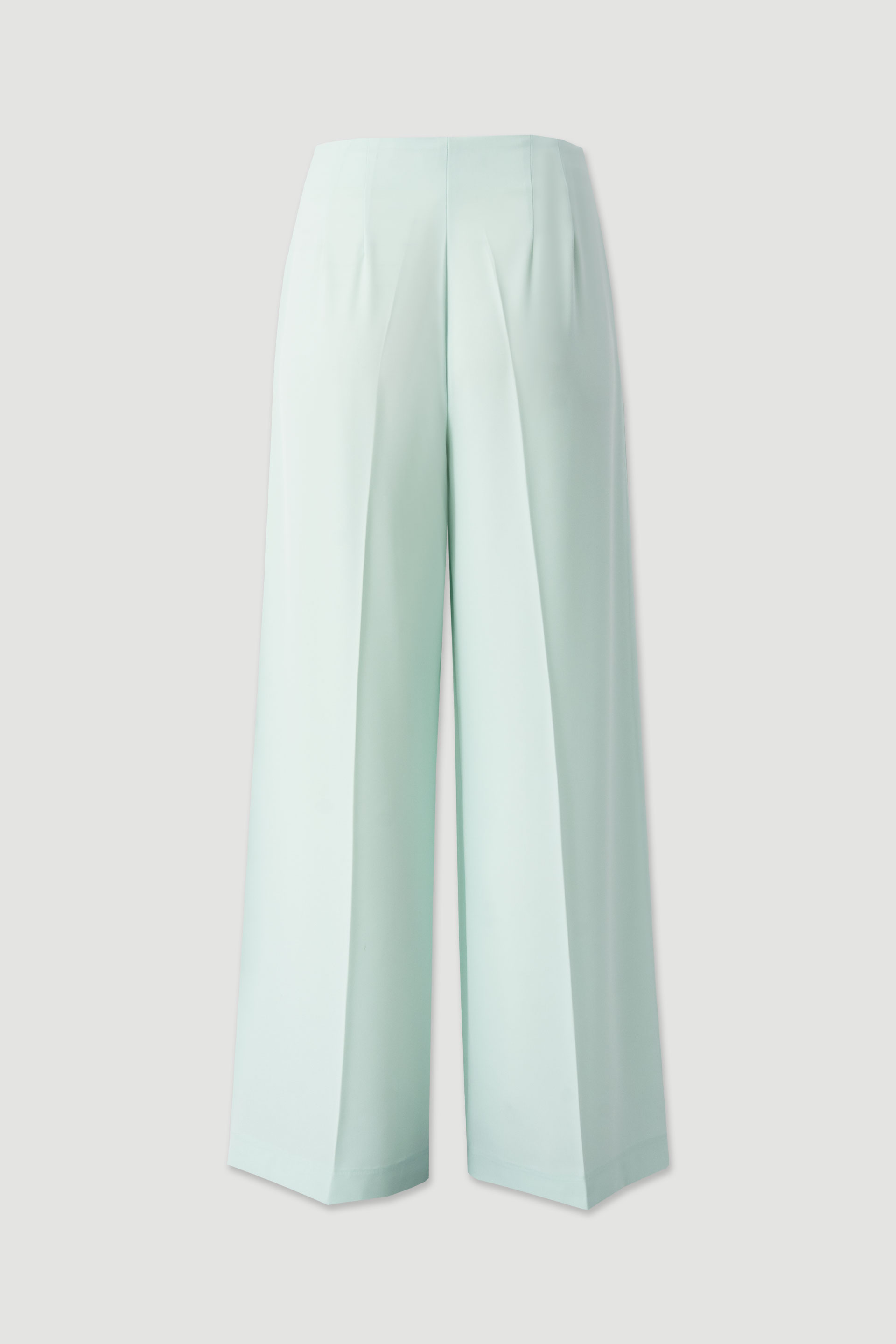 Flowing trousers with cross-over fastening