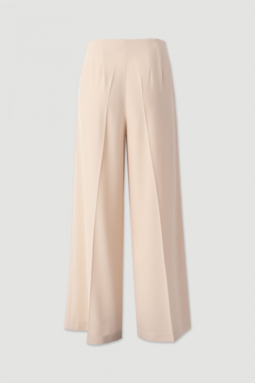 Flowing trousers with cross-over fastening Flowing trousers with cross-over fastening