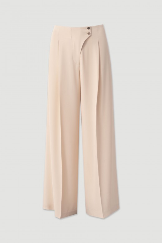 Flowing trousers with cross-over fastening Flowing trousers with cross-over fastening