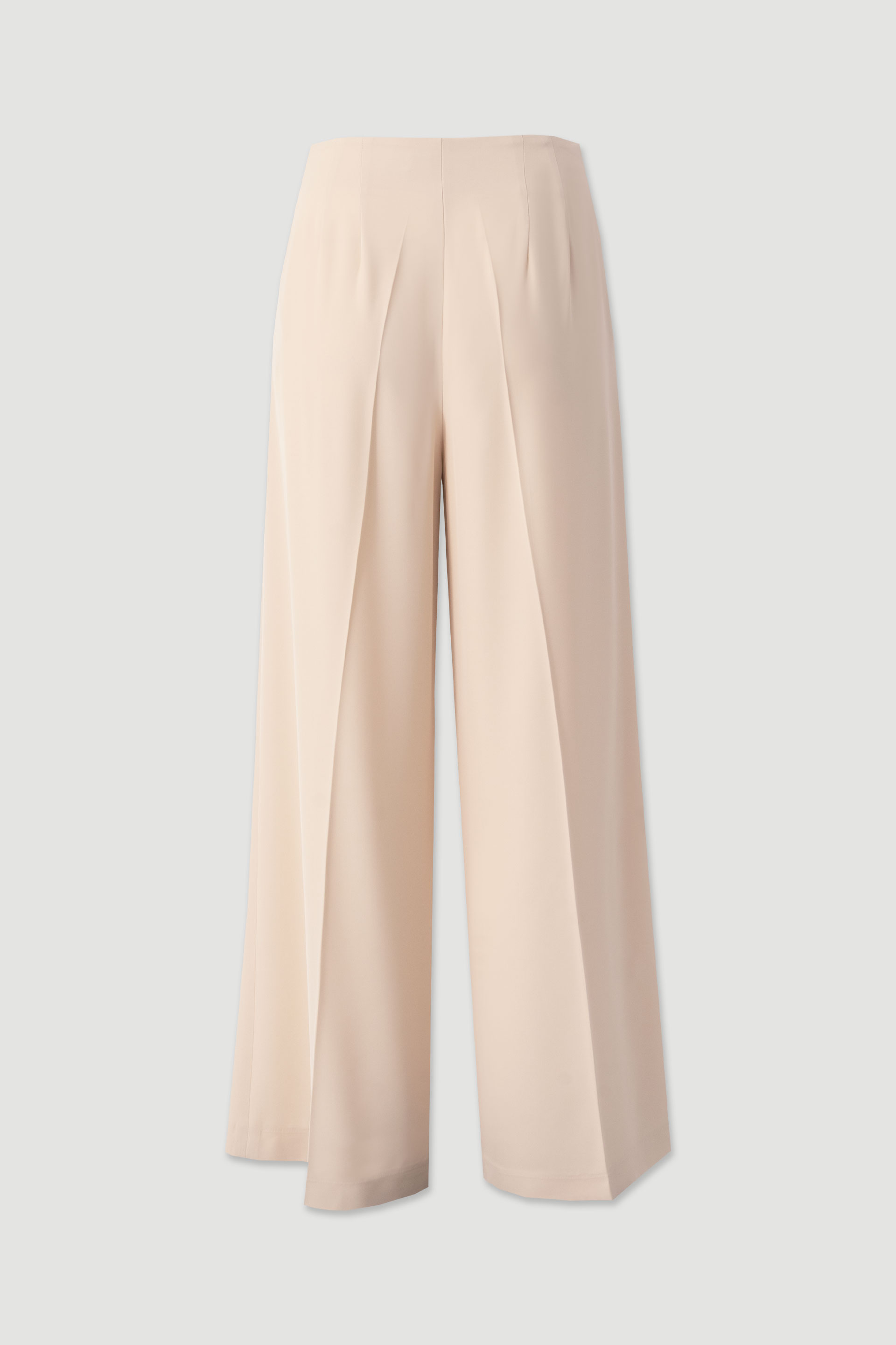 Flowing trousers with cross-over fastening