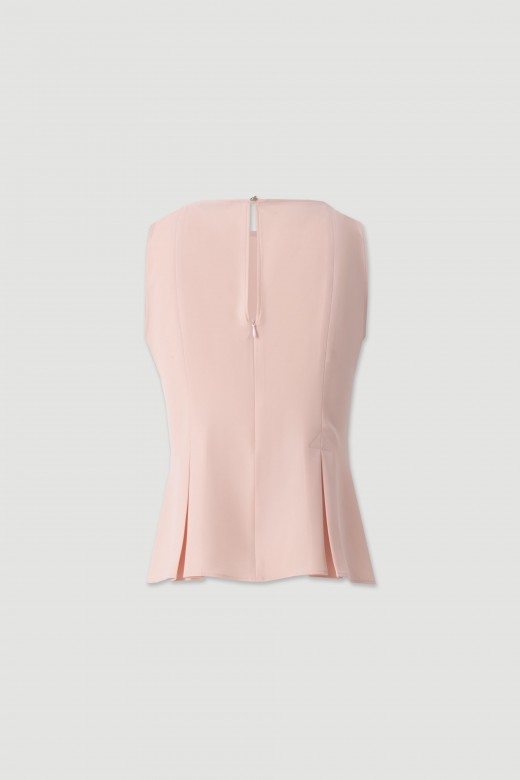Sleeveless flowing top with side slits Sleeveless flowing top with side slits