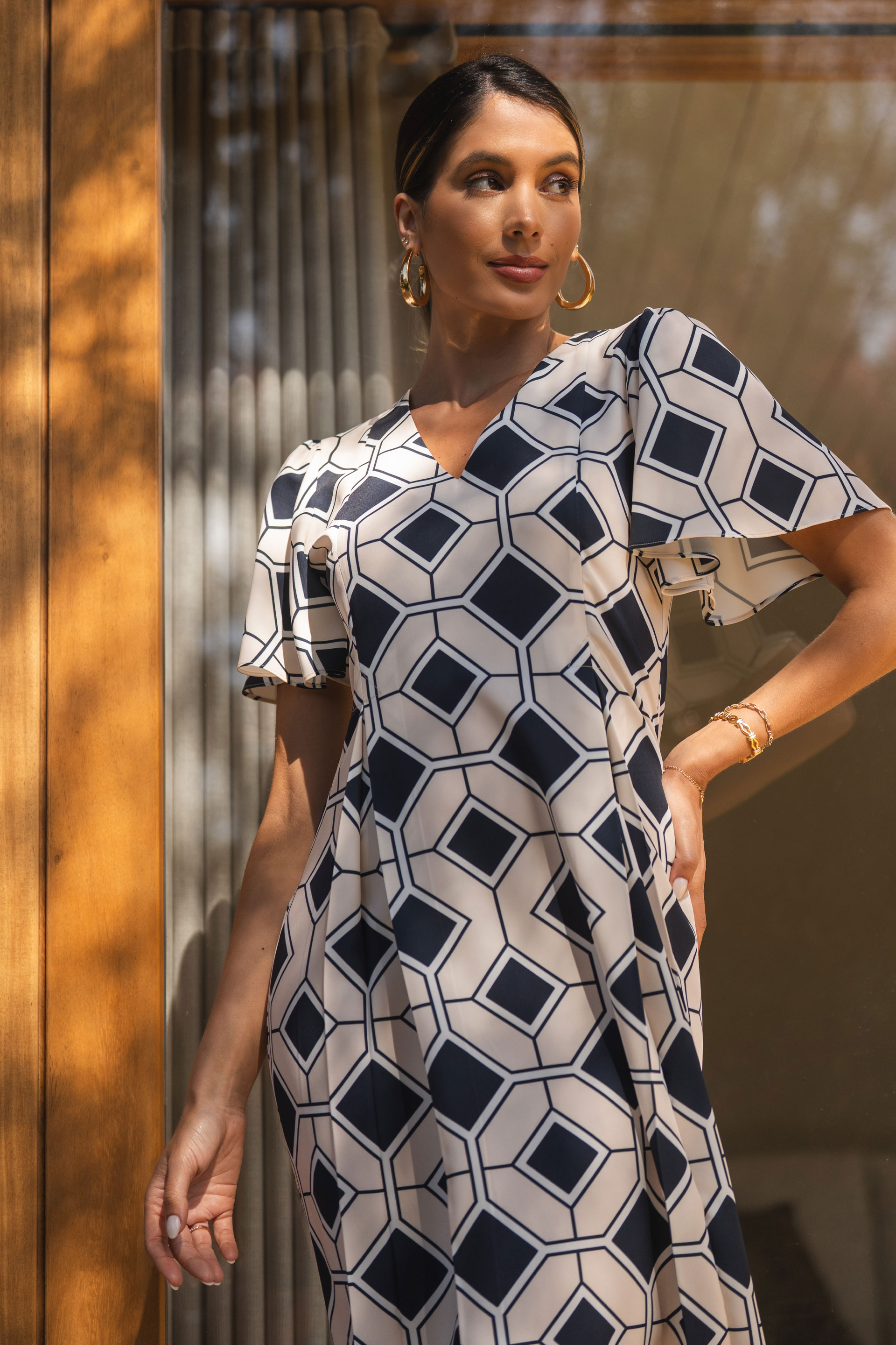 Fitted dress with geometric pattern