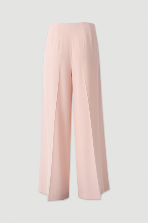 Flowing trousers with cross-over fastening Flowing trousers with cross-over fastening