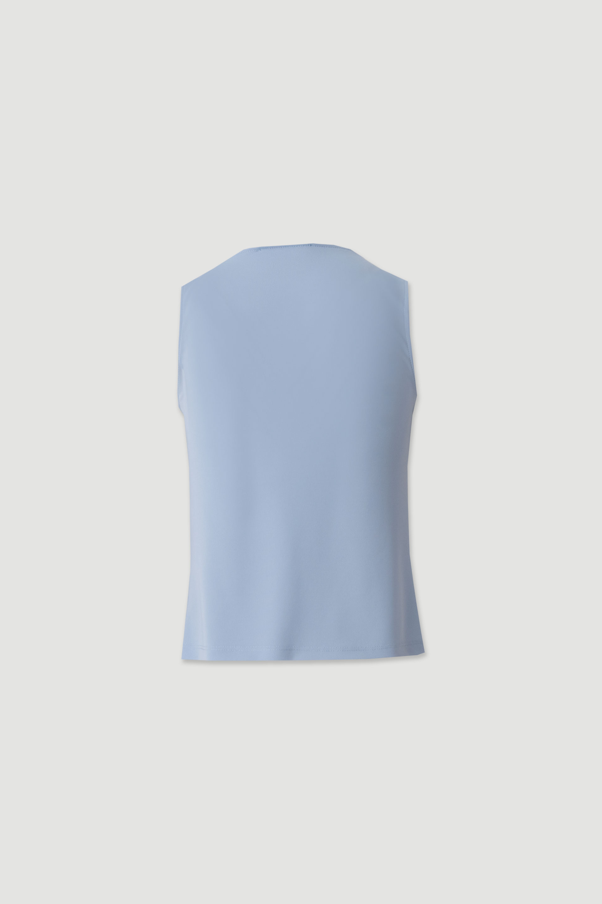 Top with draped neckline