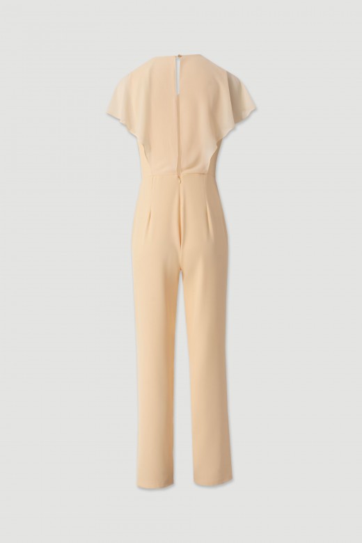 Flowy jumpsuit with a crossover neckline. Flowy jumpsuit with a crossover neckline.