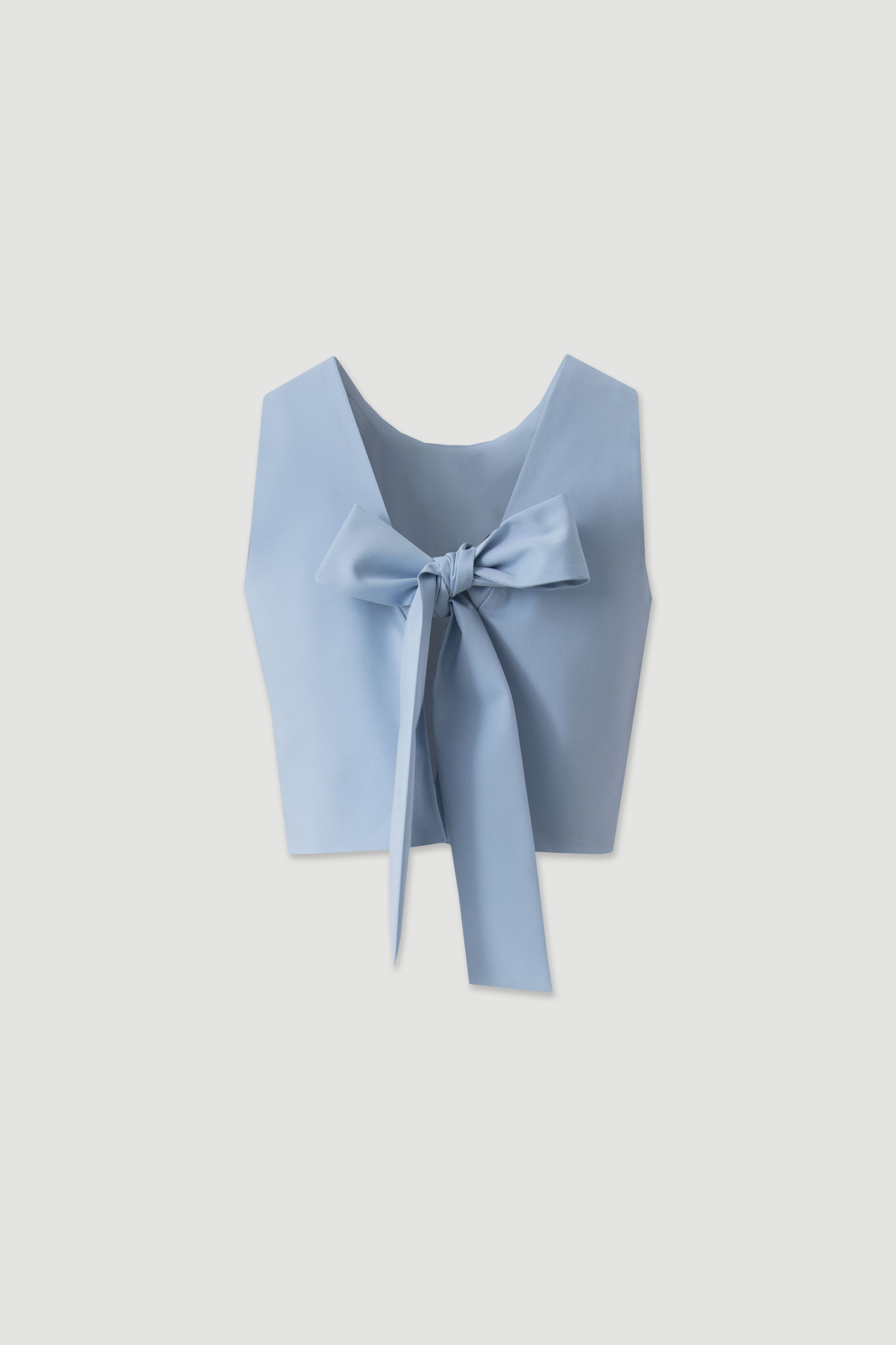 Top with back tie closure