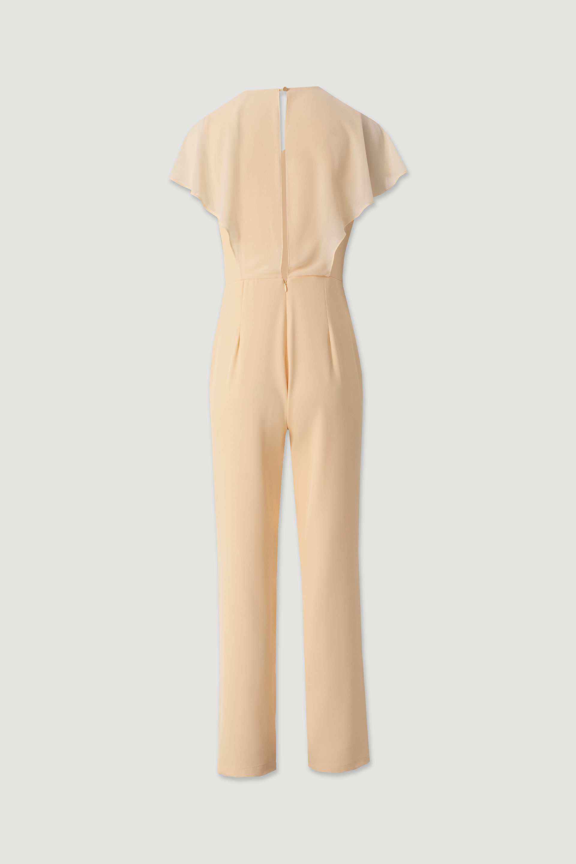 Flowy jumpsuit with a crossover neckline.