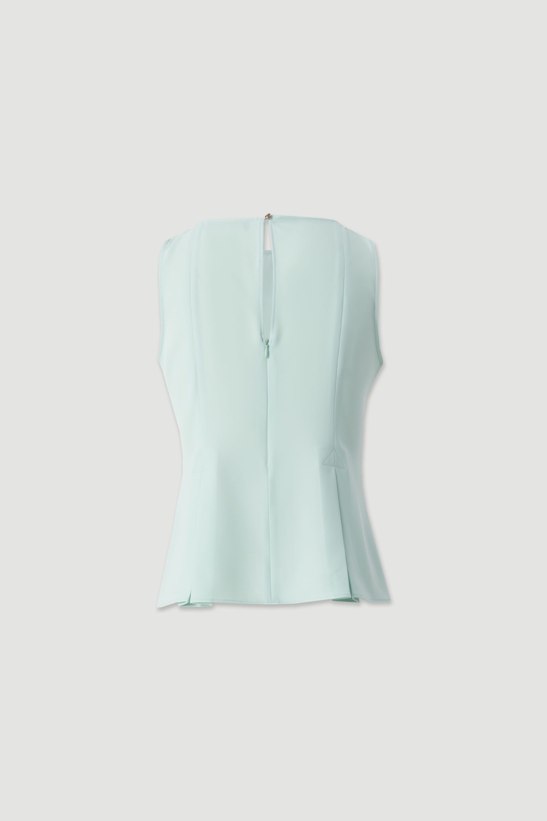 Sleeveless flowing top with side slits