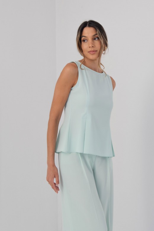 Sleeveless flowing top with side slits Sleeveless flowing top with side slits