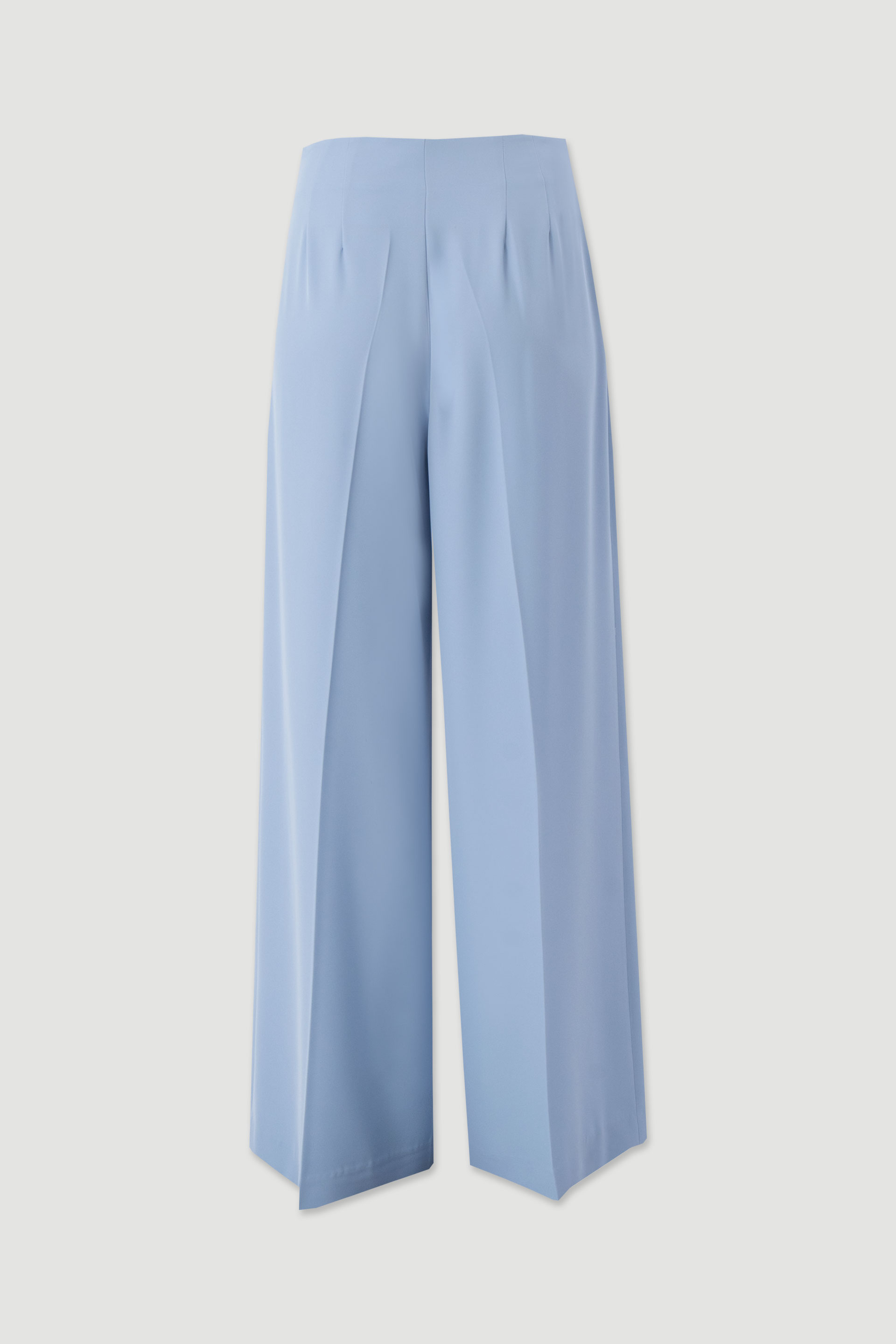 Flowing trousers with cross-over fastening