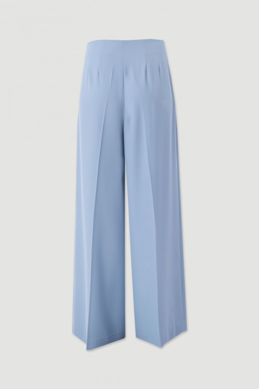 Flowing trousers with cross-over fastening Flowing trousers with cross-over fastening