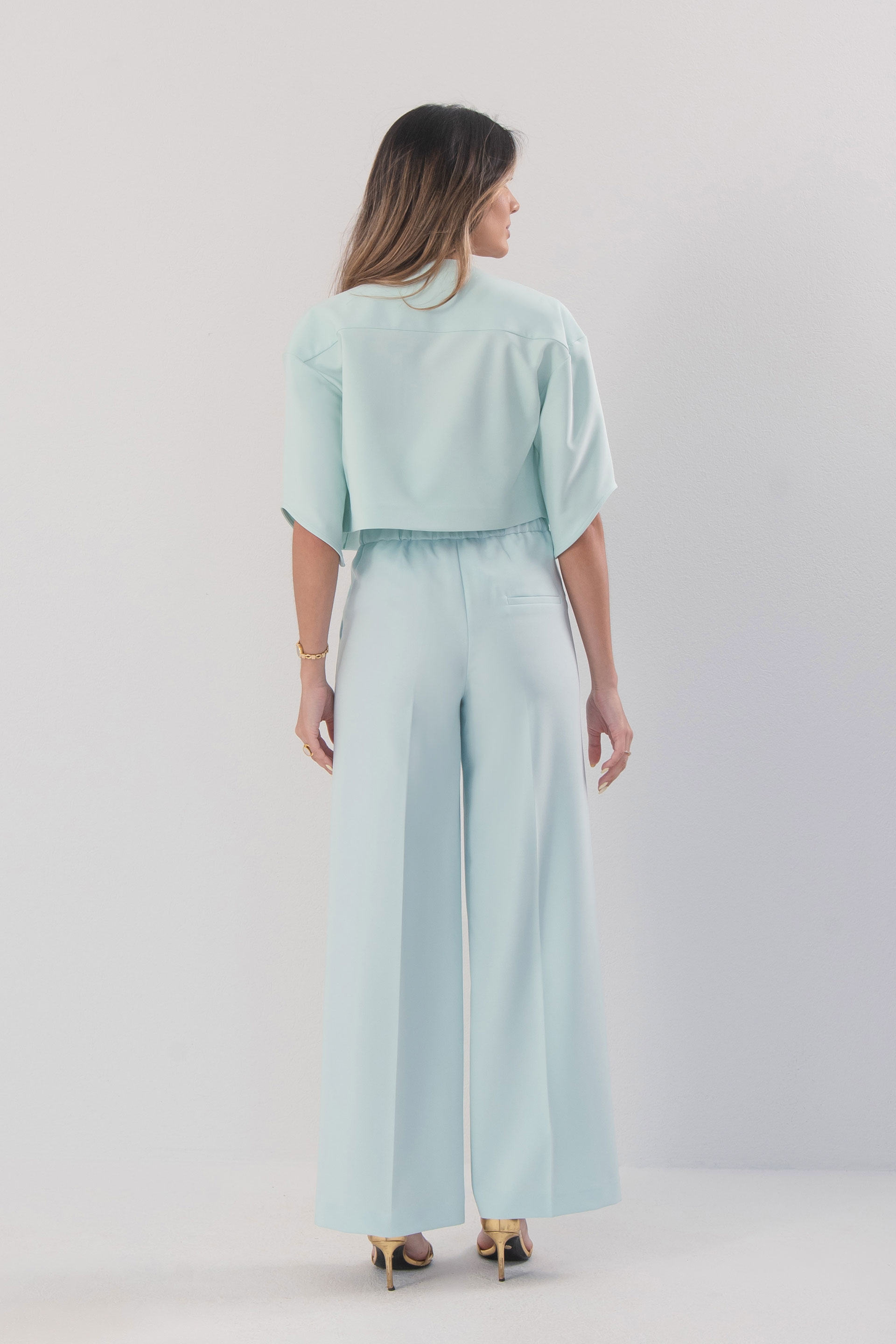 Classic wide-leg trousers with customised metallic button