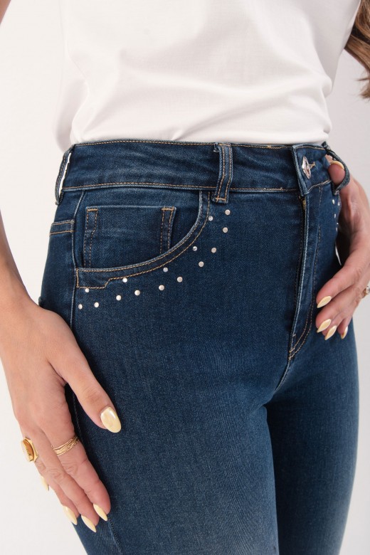 Skinny jeans with metallic transfers on the pockets Skinny jeans with metallic transfers on the pockets