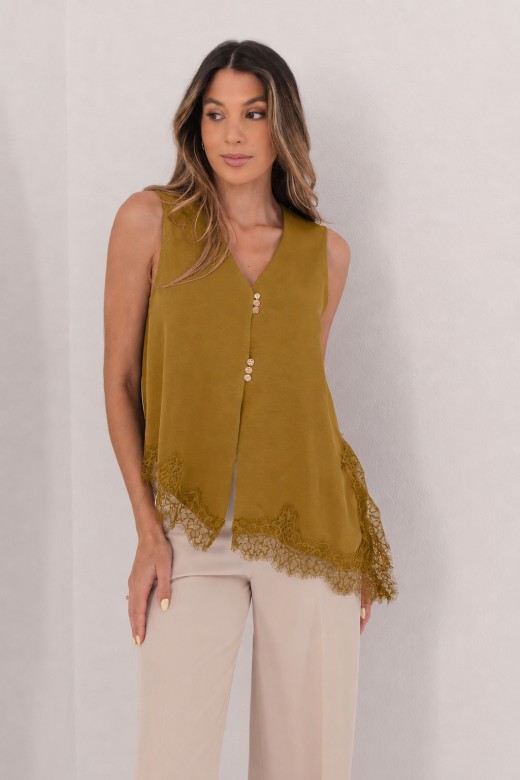 Asymmetrical satin blouse with lace trim Asymmetrical satin blouse with lace trim