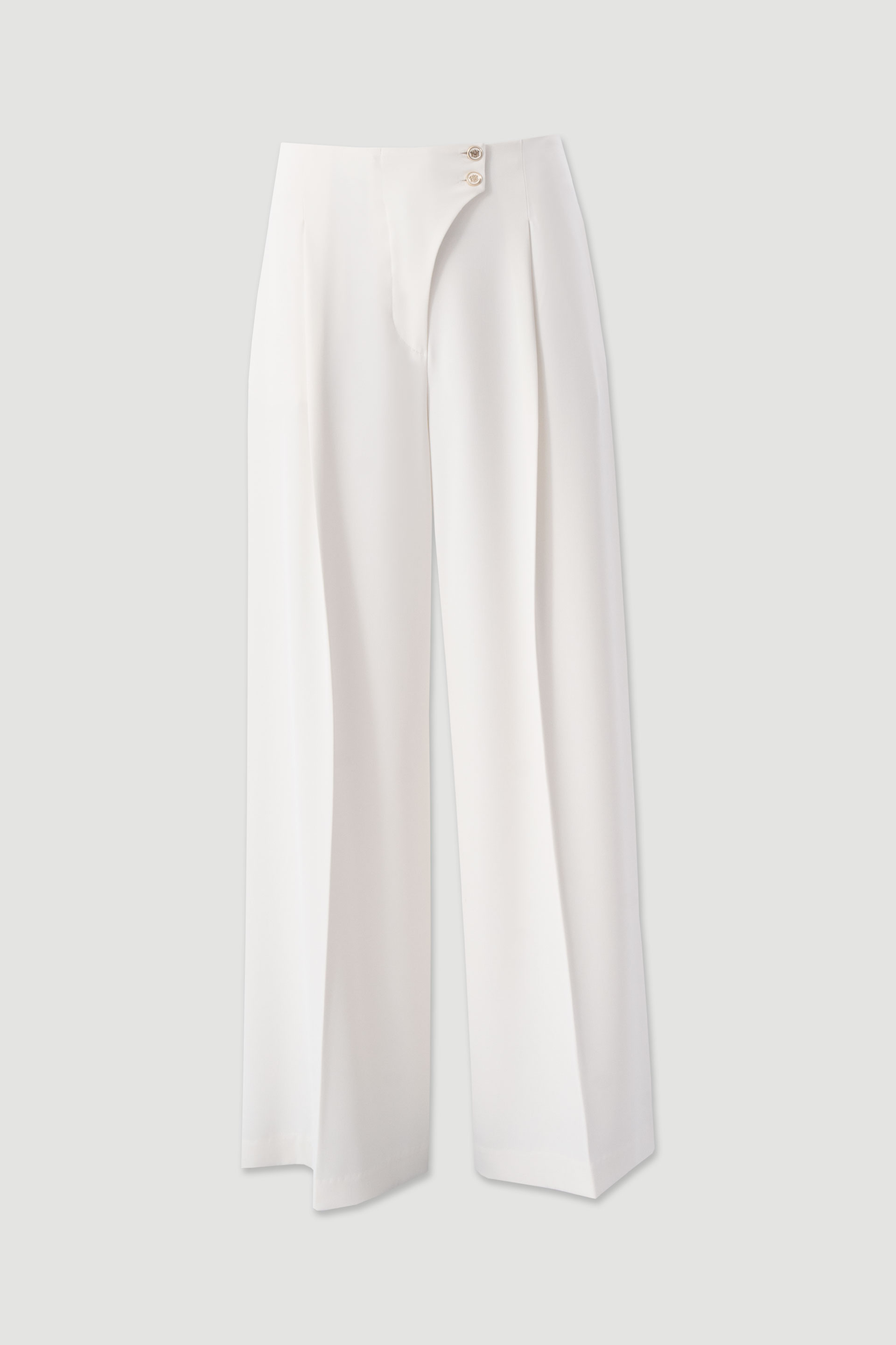 Flowing trousers with cross-over fastening