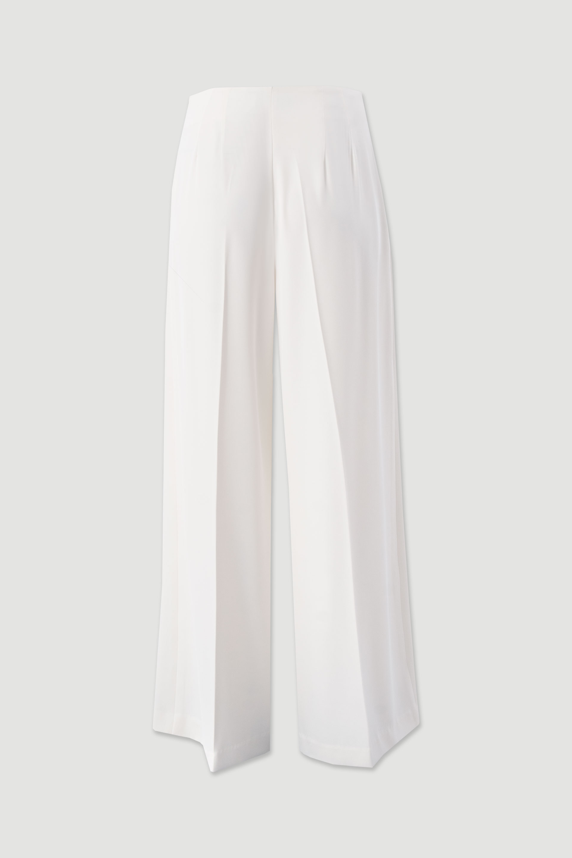 Flowing trousers with cross-over fastening