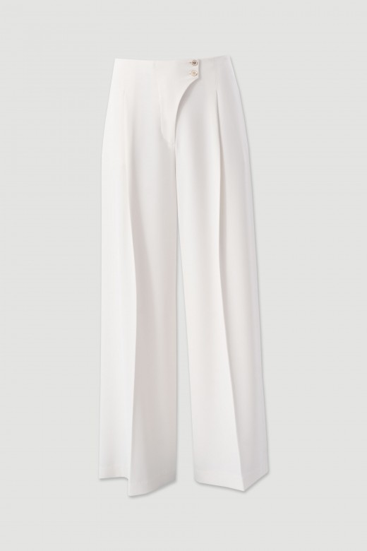 Flowing trousers with cross-over fastening Flowing trousers with cross-over fastening