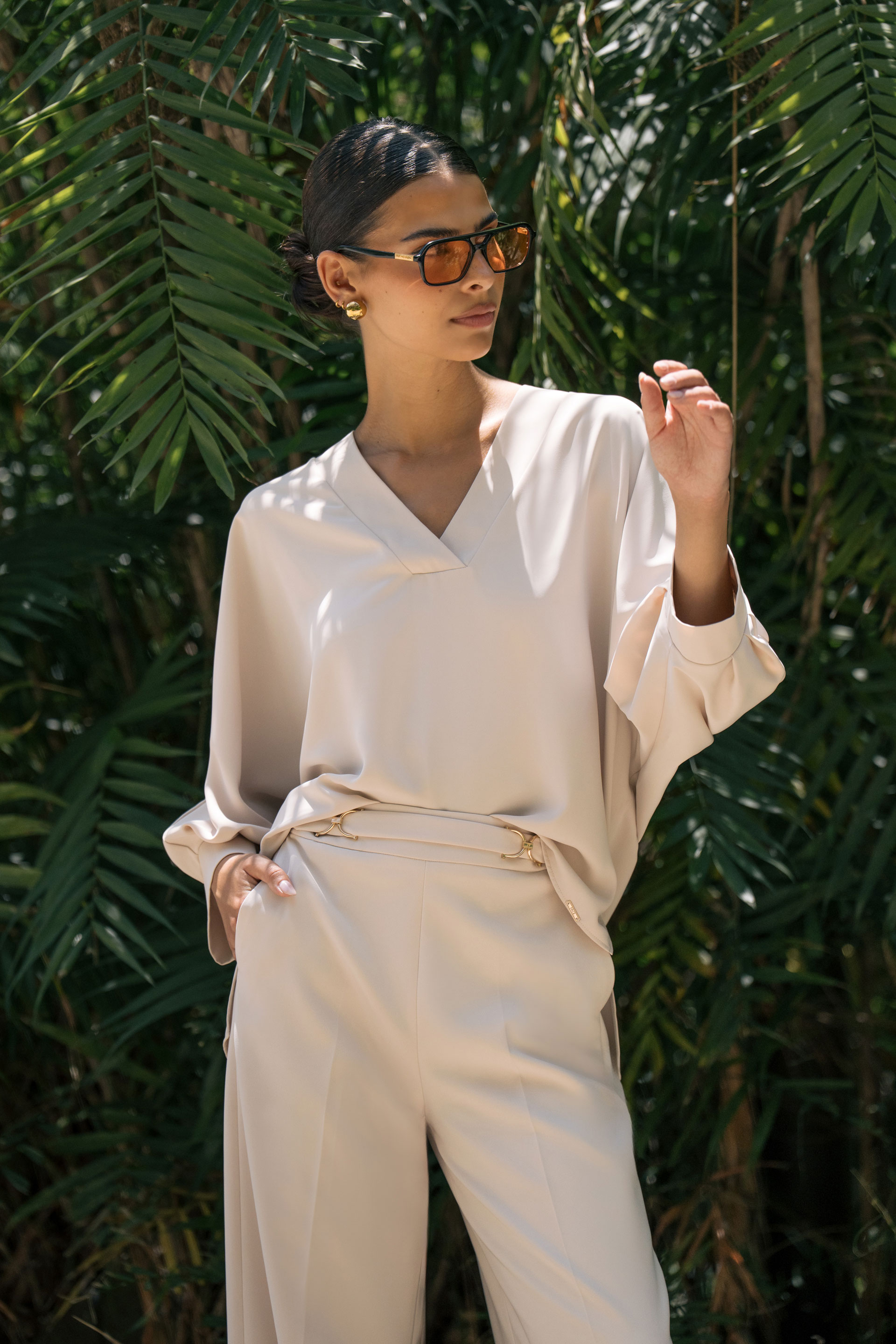 Asymmetrical fluid tunic