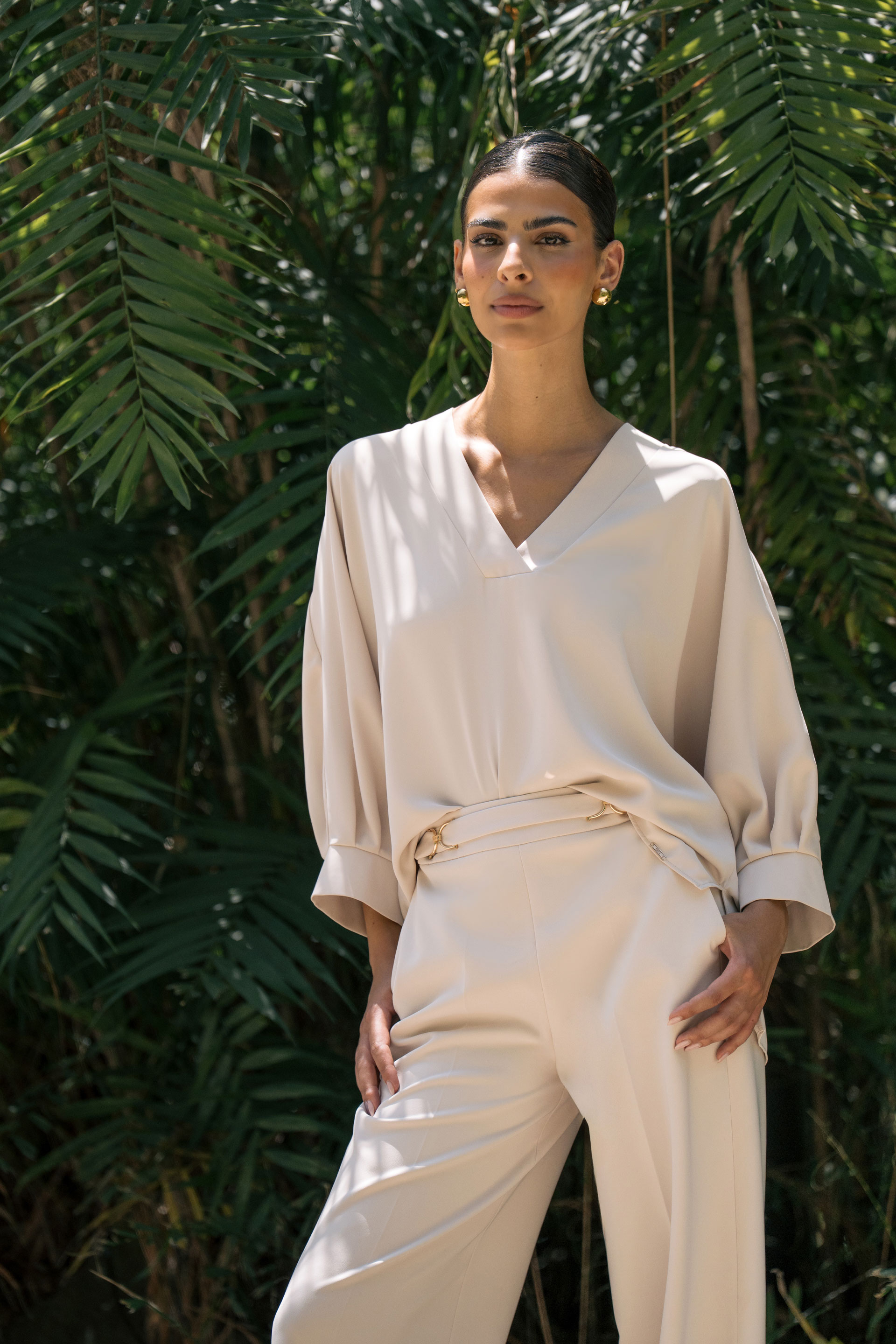 Asymmetrical fluid tunic