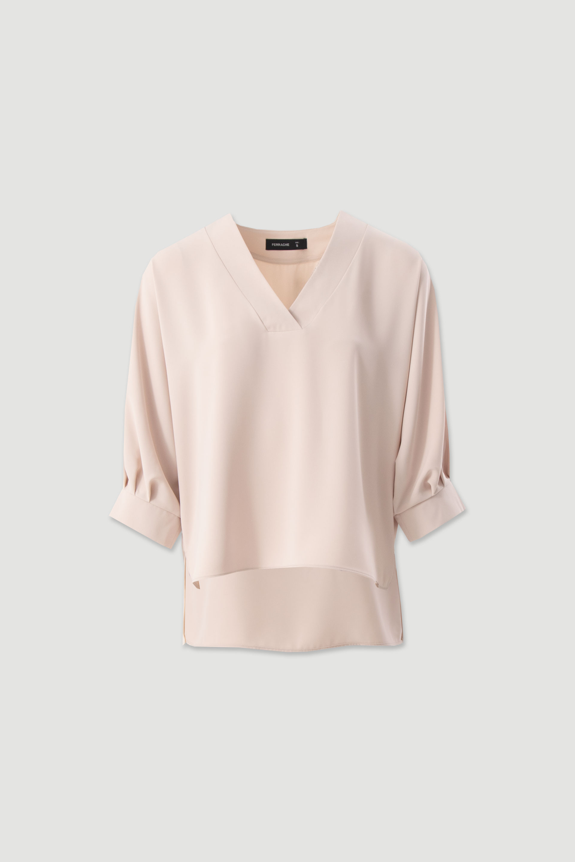 Asymmetrical fluid tunic