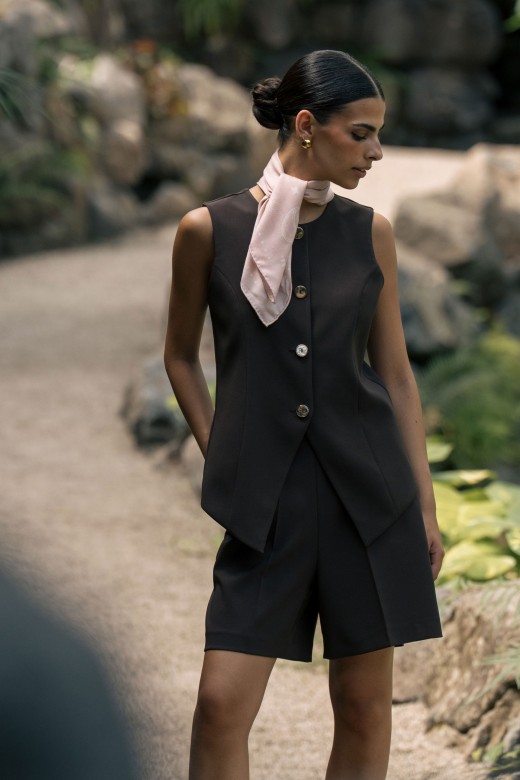 Structured vest with metallic buttons Structured vest with metallic buttons