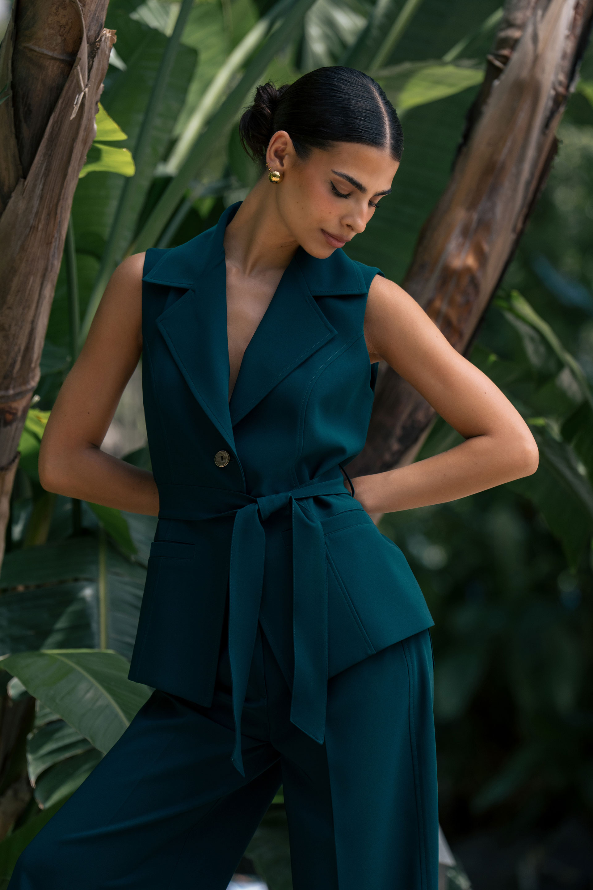 Tailored vest with belt