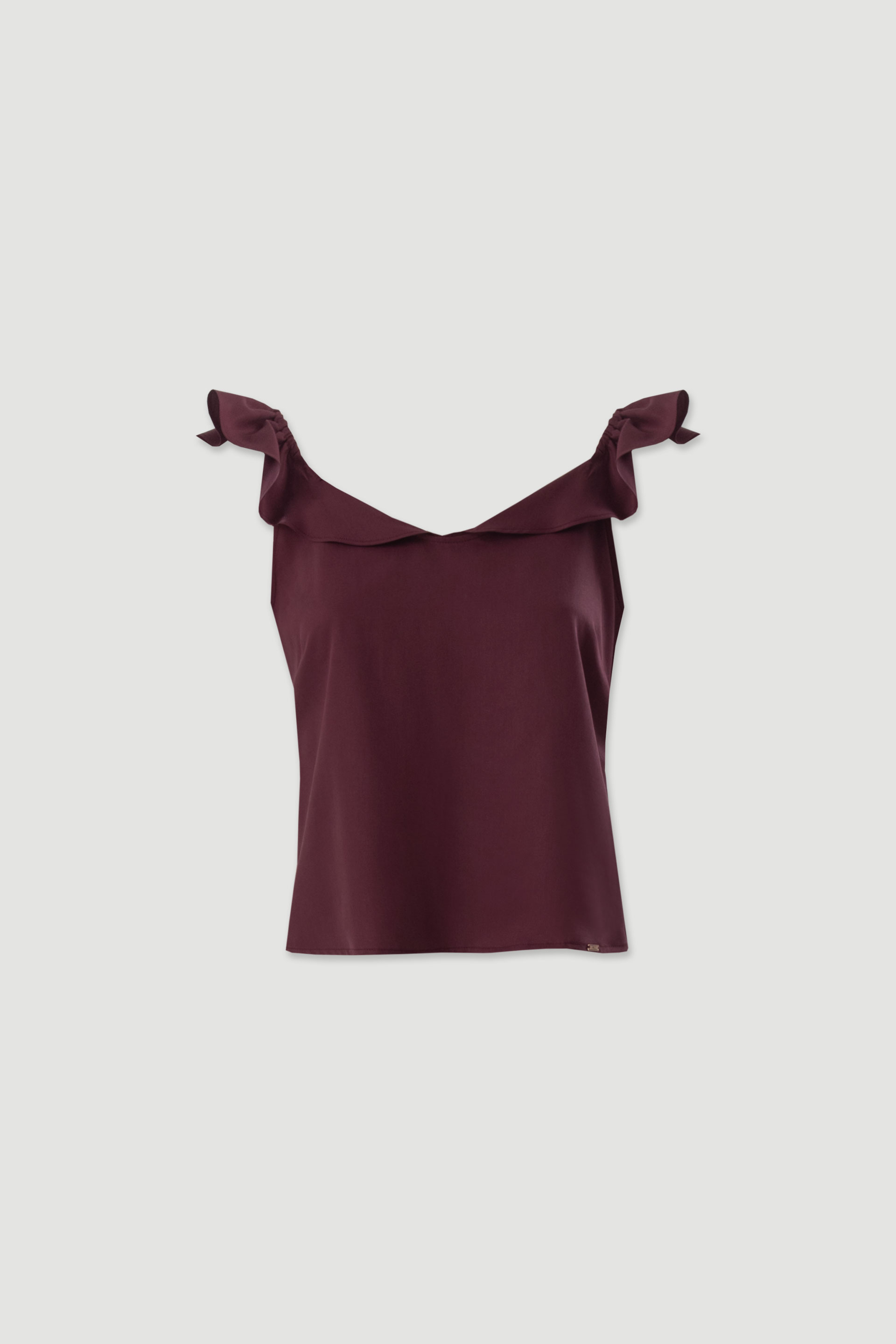 Top with ruffle straps and back bow