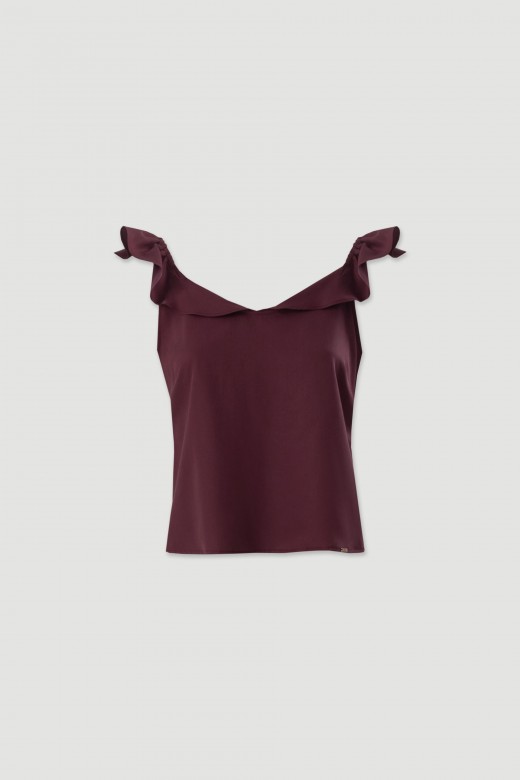 Top with ruffle straps and back bow Top with ruffle straps and back bow