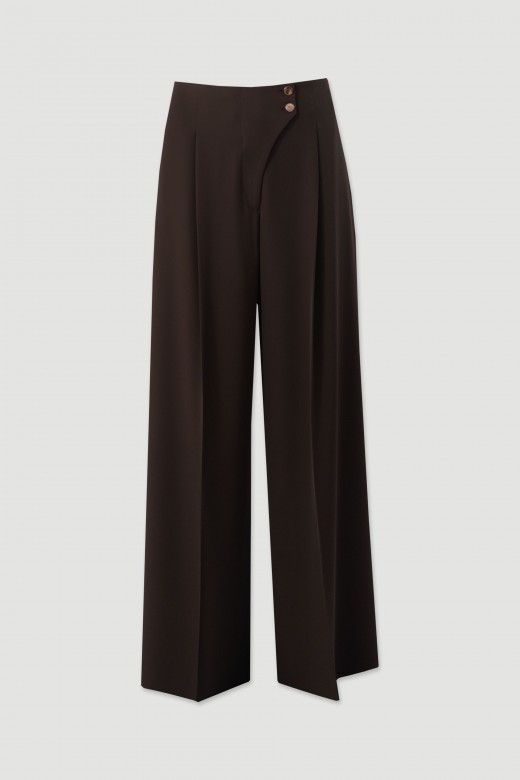 Wide leg trousers with asymmetric fastening Wide leg trousers with asymmetric fastening