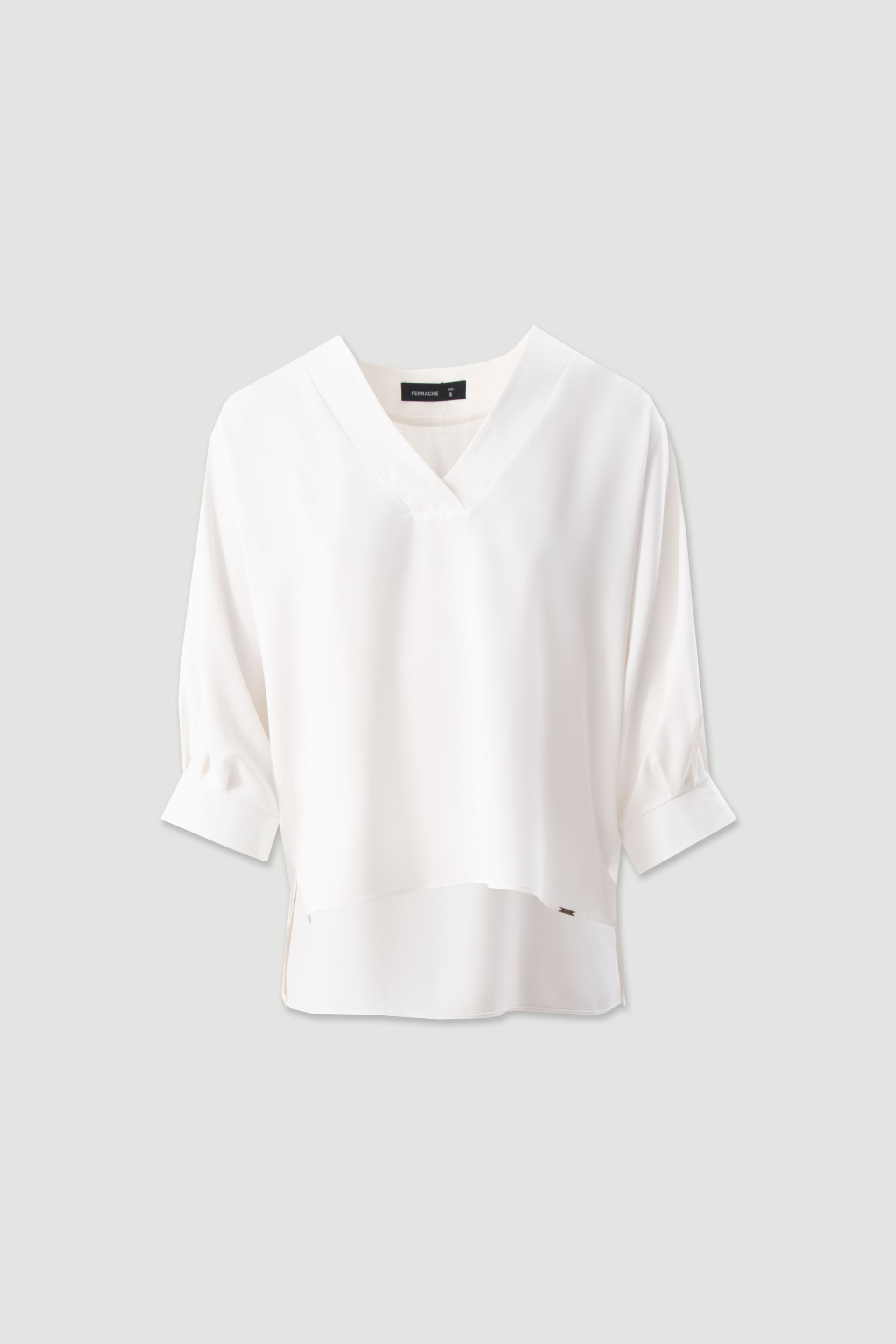 Asymmetrical fluid tunic