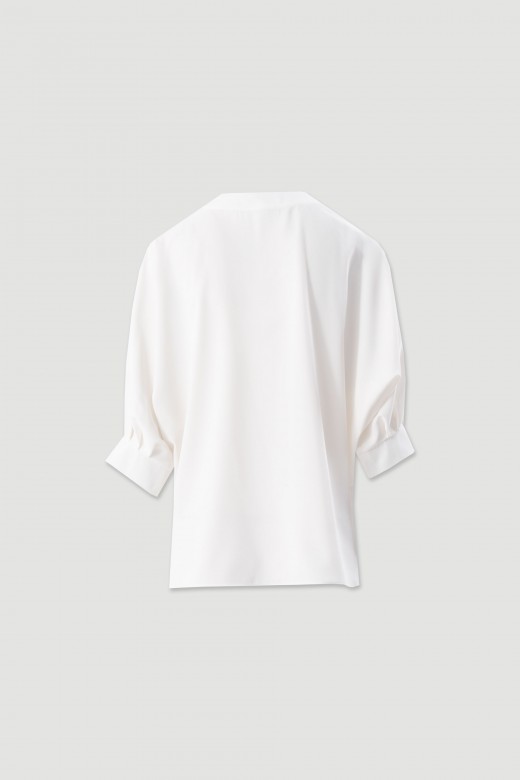 Asymmetrical fluid tunic Asymmetrical fluid tunic