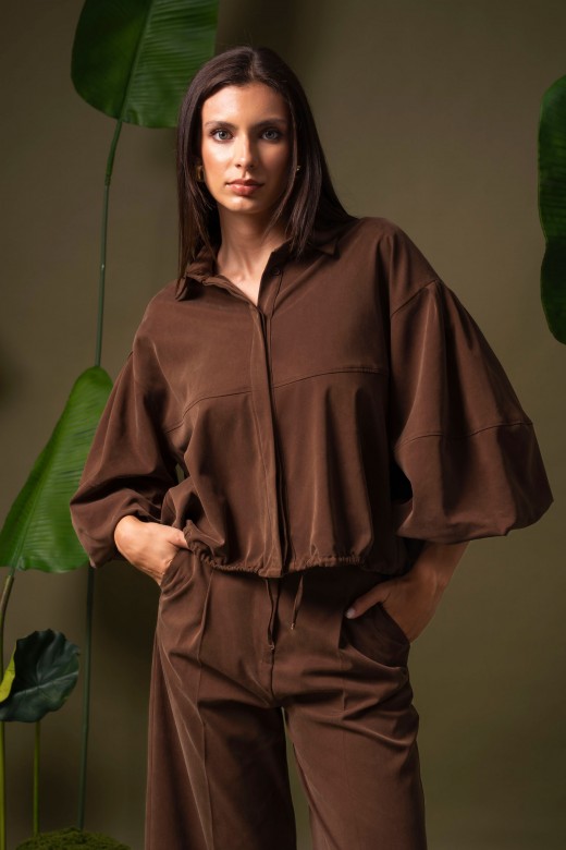 Fluid jacket with 3/4 sleeves and adjustable waist Fluid jacket with 3/4 sleeves and adjustable waist