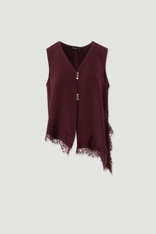 Asymmetric blouse with lace Asymmetric blouse with lace
