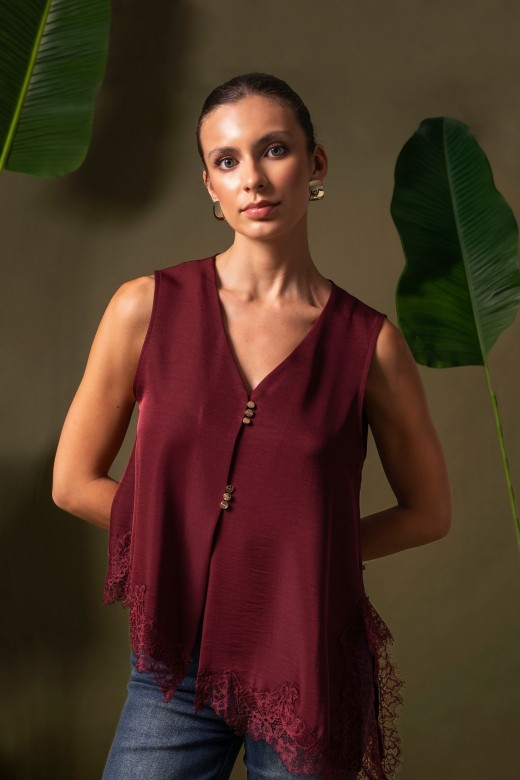 Asymmetric blouse with lace Asymmetric blouse with lace
