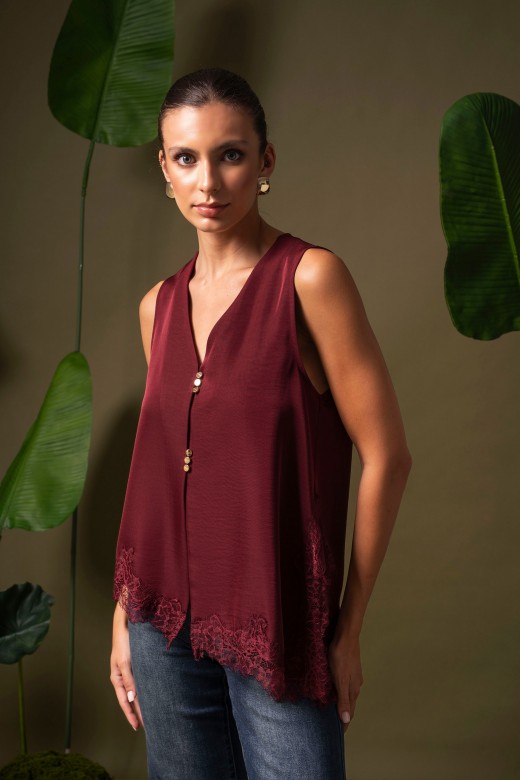 Asymmetric blouse with lace Asymmetric blouse with lace