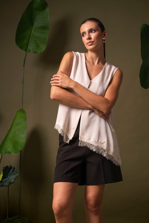 Asymmetric blouse with lace Asymmetric blouse with lace