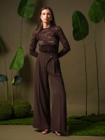 Wide leg trousers with asymmetric fastening Wide leg trousers with asymmetric fastening