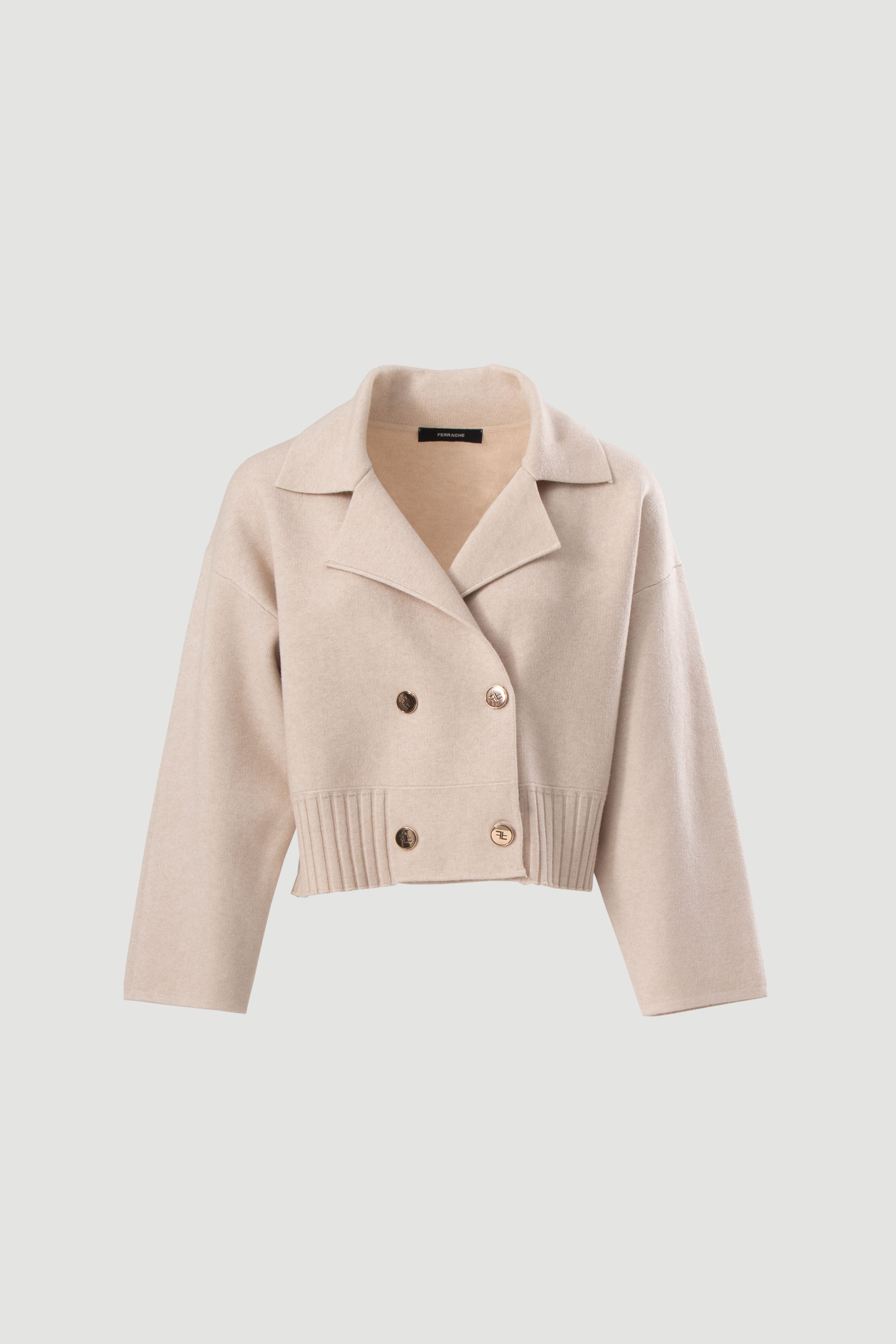 Veste courte en maille à fermeture croisée