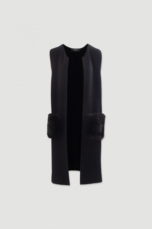 Long knit vest with faux fur pockets Long knit vest with faux fur pockets