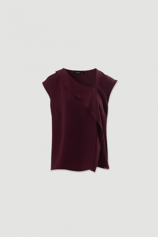 Blouse fluide à volant asymétrique Blouse fluide à volant asymétrique
